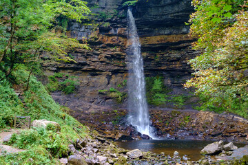 Hardraw Force Waterfall in early autumn colours.  England`s highest  single drop waterfall is in The Yorkshire Dales,.