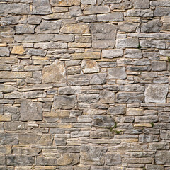 Nicely restored faced random stone wall construction