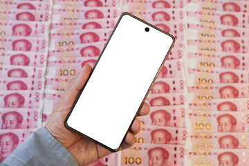 white black smartphone screen for text and design. the concept of accumulating profitability and earnings through a smartphone. Chinese yuan and smartphone , copy space, top view.