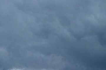 Blue sky and clouds background with lots of copy space.