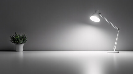 A minimalist workspace featuring a desk lamp and a potted plant against a neutral wall, creating a calm and modern atmosphere.