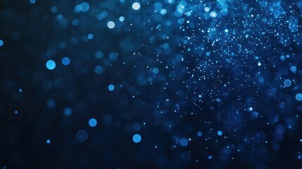 Fototapeta premium Abstract blue bokeh background with shimmering particles