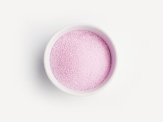 powder pink matcha tea in a white bowl