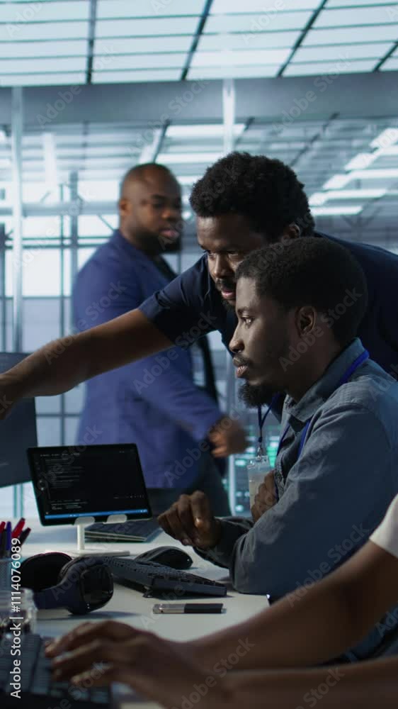 Poster vertical video manager supervising server room workers developing disaster recovery plans ensuring m