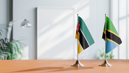 FLAGS OF MOZAMBIQUE AND TANZANIA ON TABLE