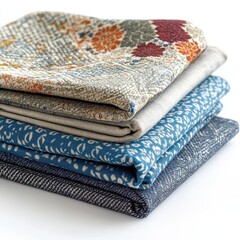 Neatly folded fabric displaying crisp textures and intricate patterns, perfect for textile designers, isolated on a white background.