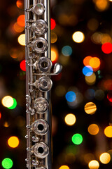 a flute with a christmas tree in the background © Blessings Captured