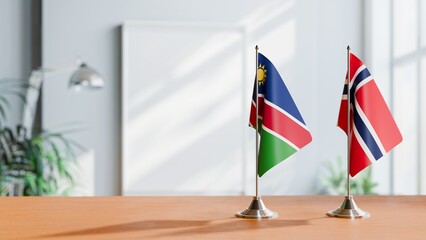 FLAGS OF NAMIBIA AND NORWAY ON TABLE