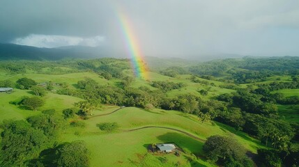 Rainbow Arcs Over Lush Green Rolling Hills And Farmland