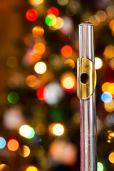 a flute with a christmas tree in the background © Blessings Captured