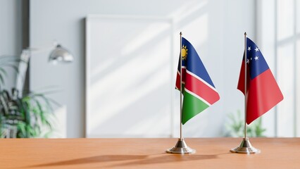 FLAGS OF NAMIBIA AND SAMOA ON TABLE