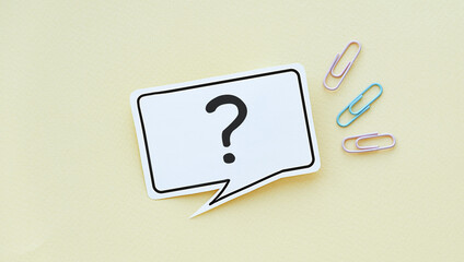 Question Mark speech bubble isolated on yellow background.