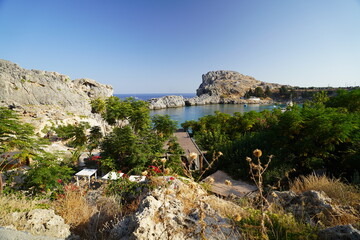 Saint Paul bay , rocky creek with blue water