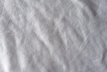 white plush fabric texture background , background pattern of soft warm material
