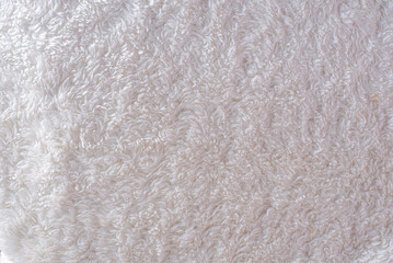 close-up of wool with a fluffy texture, the focus is on the intricate fibers, highlighting its warmth and comfort