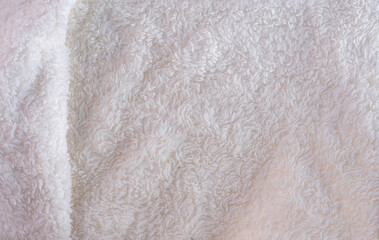 white plush fabric texture background , background pattern of soft warm material