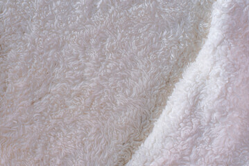 white plush fabric texture background , background pattern of soft warm material