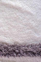 white plush fabric texture background , background pattern of soft warm material
