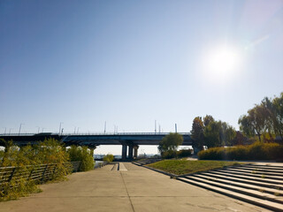 panoramic view of the river park, Yeouido Hangang River Park, in Seoul, Korea, with a broad bridge, and a cityscape in the backdrop	
