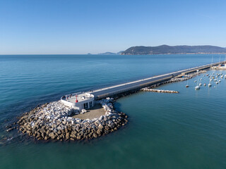 Aerial view of the new waterfront built on the breakwater of the commercial port of Marina di Carrara, in Tuscany