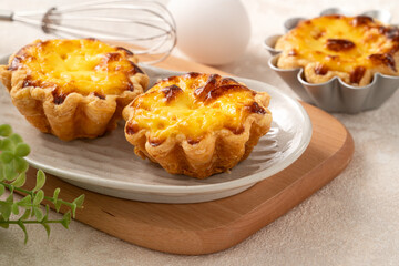 Delicious puff pastry Portuguese egg tart Pastel de nata in flower shape.