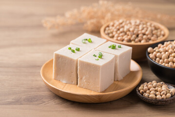 Fresh tofu with soy bean seeds, Vegan food ingredient in Asian cuisine, Plant based diet