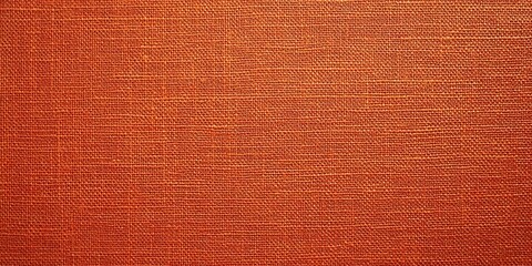 Fototapeta premium zoomed-in view of orange fabric texture with fine details soft natural lighting clean and bold design