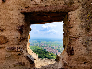 Ancient stone frame reveals a panoramic view of Eguisheim town