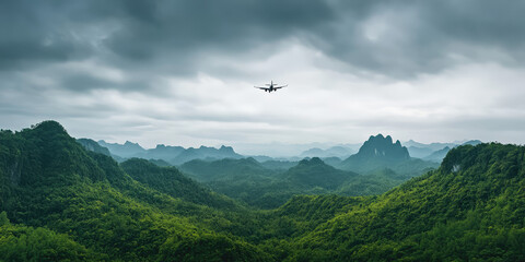 Fototapeta premium Airplane flies over a beautiful scenic natural landscape
