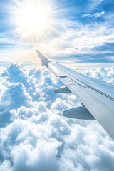 Obraz premium Airplane flying above fluffy sunny clouds, view from plane window of plane wing and sky