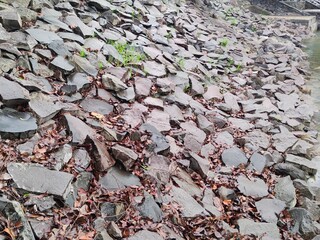 A series of split stones can be used to decorate the edge of a pool, or as part of a concrete...