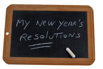 Obraz premium Ardoise d'école sur laquelle est écrit avec une craie bonnes résolutions en anglais