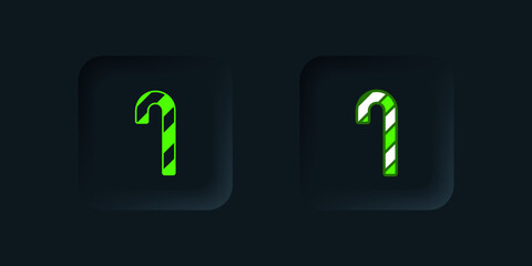 Green Christmas candy cane with stripes icon isolated on black background. Merry Christmas and Happy New Year. Black square button. Vector