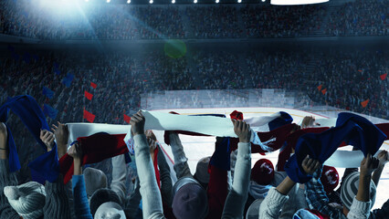 Back view of enthusiastic fans raising national flags and scarves while cheering for their team in vibrant sports stadium. Hockey game. Concept of sport, game, competition, emotions