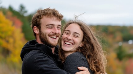 Happy Couple Embracing in Autumn Landscape