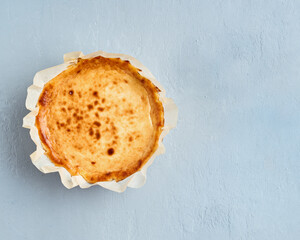 Cheesecake dessert for festive. Copy space, flat lay. Basque dessert. Summer recipe. Homemade baking.