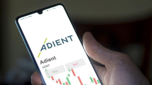 March 26th 2024, logo of Adient on a white wall in a hall building, the $ADNT brand indoor.
