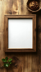 Empty wooden frame on rustic wood table with plant and basket.
