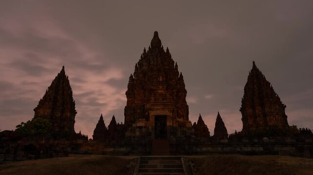 Yogyakarta, Indonesia - Time Lapse Prambanan Candi Roro Jonggrang on Morning Sunrise, a 9th century temple dedicated to the Hindu Trimurti, the trinity of Brahma, Vishnu and Shiva
