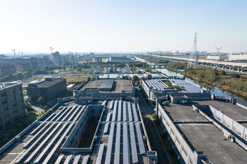 The solar photovoltaic power station on the factory roof