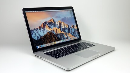 MacBook Pro with Stunning Mountain Landscape Wallpaper