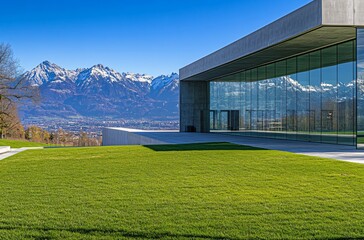 Modern villa with a green lawn and parking lot, set against a majestic mountain backdrop, blending contemporary architecture with nature for a luxurious and tranquil retreat.