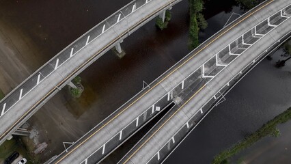 Obraz premium Flooded streets in big city after extreme rainfall storm in coastal city of Jacksonville, Florida caused by climate change and see level rise