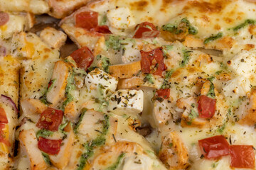 hot pizza with soft dough and cheese with ham and spices