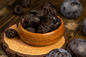 ripe purple plums and dried plums