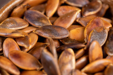 , overcooked or burnt pumpkin seeds on the table