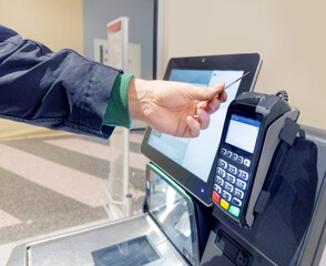 Customer pays his purchase at the supermarket,self checkout systems in  retail stores,Barcode...