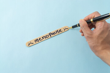 Menopause word on ice cream stick.