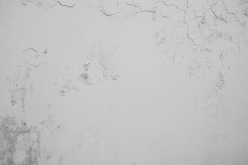 Textures of cracked plaster on an aged wall reflecting time and decay. Generative AI