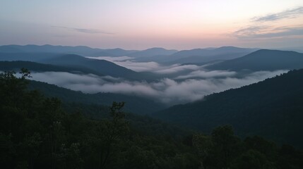 Fototapeta premium Breathtaking Foggy Mountain Range Showcasing Layers of Peaks Fading into the Horizon, Perfect for Travel and Nature Enthusiasts